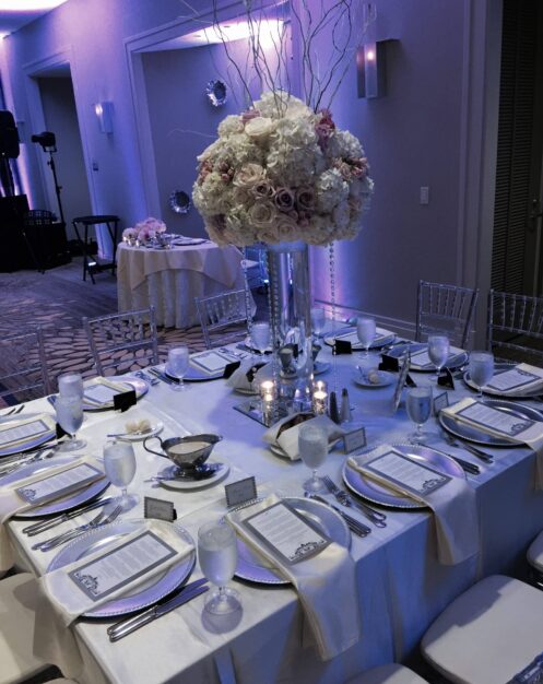 Elevated wedding centerpiece with pink and white roses and hydrangeas at Villa Christina in Atlanta.