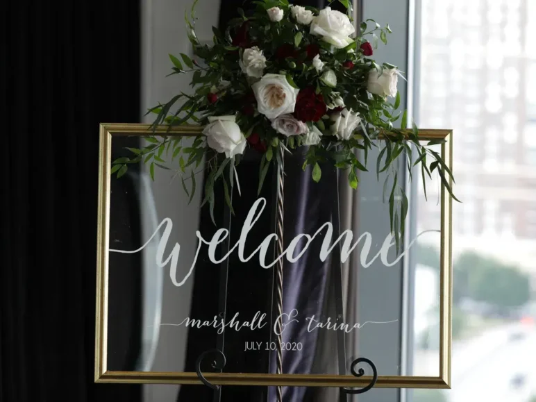 Welcome sign wedding arrangement with floral decor