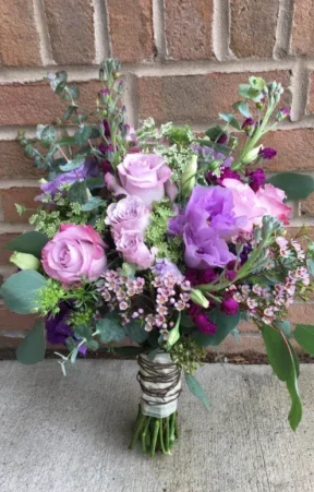 Lavender and pink nosegay bridal bouquet with roses and peonies