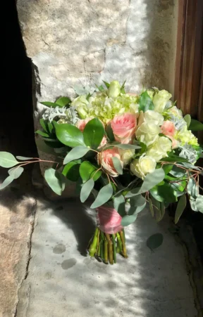 soft pink and white roses enveloped in lush greenery Bridal Bouquet